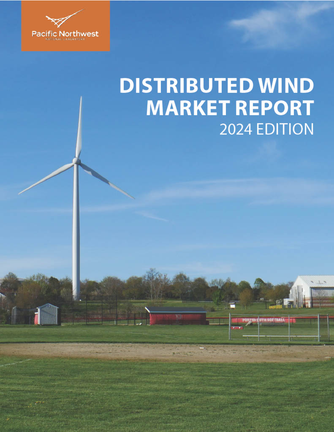 A wind turbine in grassy farmland